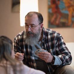 Portrait of Olga Zarichna, yoga instructor, smiling warmly.